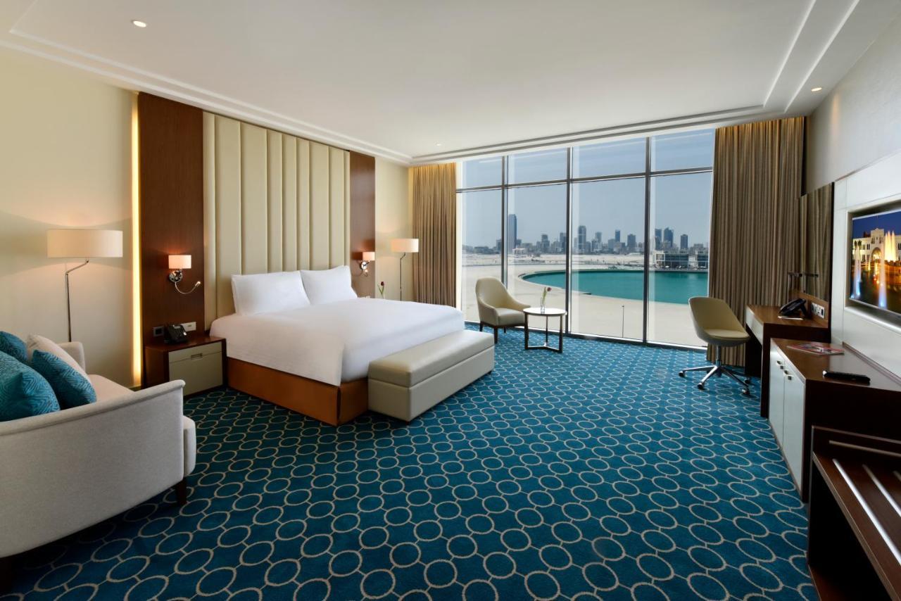 Grand Swiss-Belhotel Waterfront Seef Sanabis Esterno foto