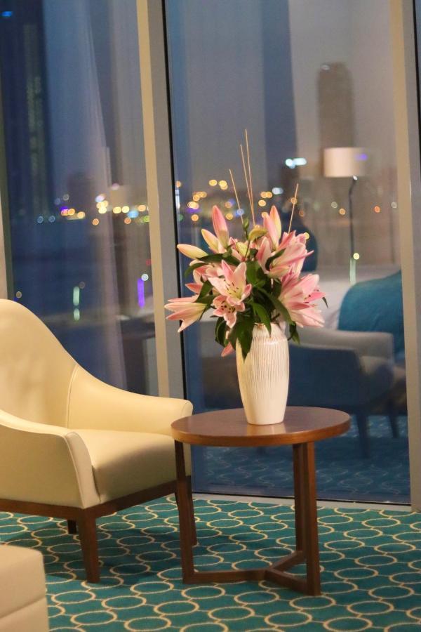 Grand Swiss-Belhotel Waterfront Seef Sanabis Esterno foto